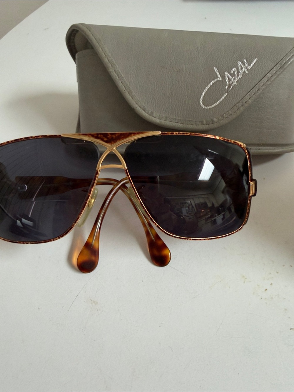 Cazal Tortoise Frame Sunglasses with Gold Accents and Dark Lenses